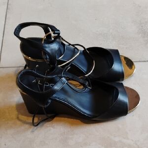 Aldo Black and Gold Strappy Wedges